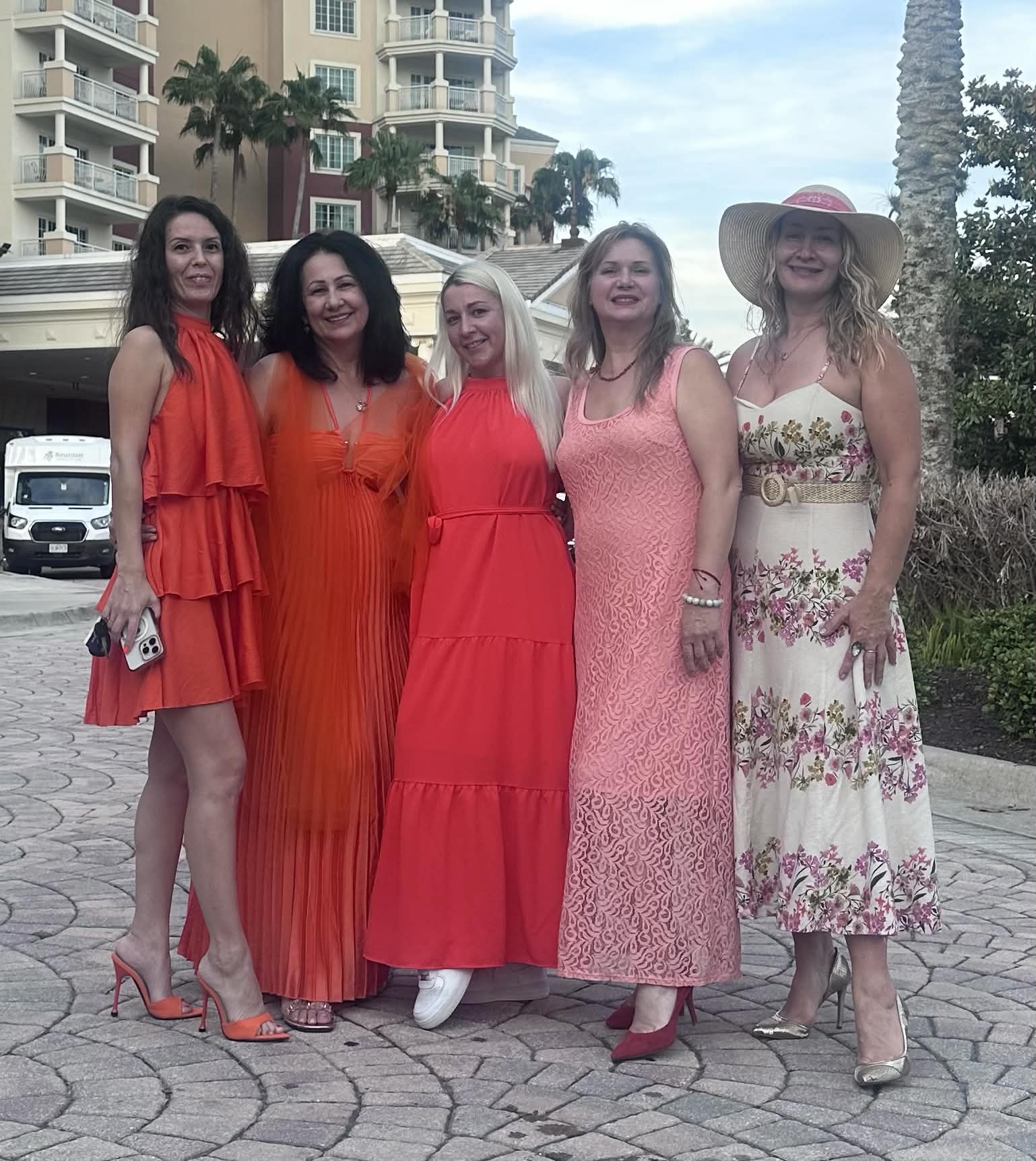 Love standing with a group of women outdoors