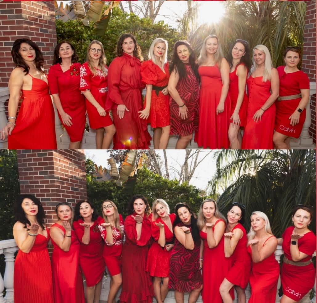 A community group dressed in red during a gathering